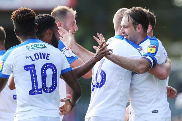 Brett Pitman celebrates his goal with his Pompey team-mates Picture: Joe Pepler