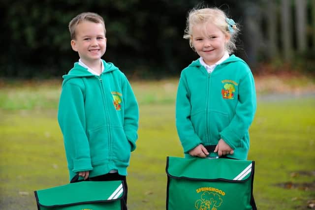 Layton Fletcher on his 5th birthday with school friend Miley Horrell, four, on their first day at Springwood Infant School. Photo: Malcolm Wells