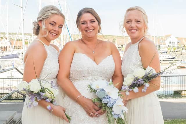 Bridesmaids Rhyanna, Tinas daughter, (left) and Claire Maker (right) were full of smiles on Tinas big day. Picture: Carla Mortimer Photography