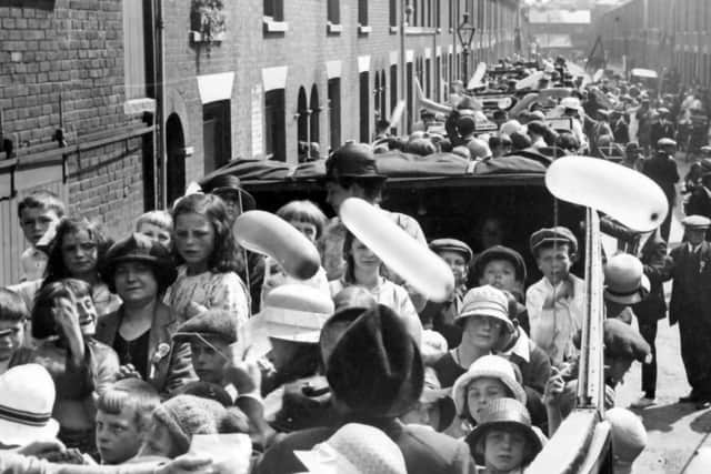Last Thursday I published a photo of children in a fleet of charabancs and asked where it was.