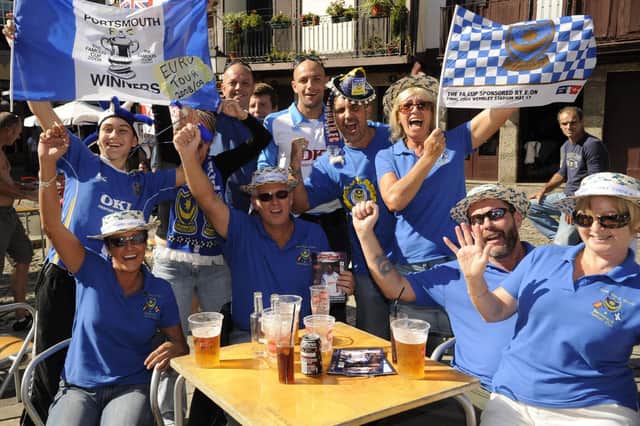 Pompey fans in the main square in Guimaraes ahead of the evening's Uefa Cup clash. Pictures: Steve Reid