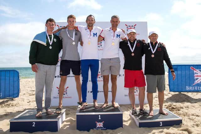 Guy Elder and Will Mahoney of Southsea Rowing Club on the podium in Sandbanks