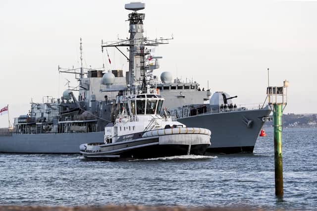 HMS Kent entering Portsmouth after her refit
