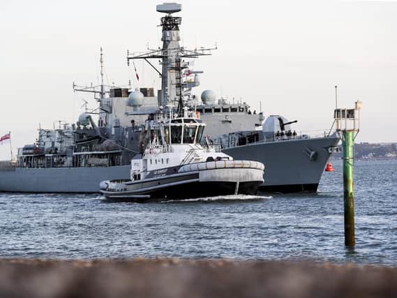 HMS Kent entering Portsmouth after her refit