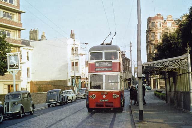 A trolleybus picks up passengers in Southsea Terrace. Notice how much wider they were than trams. Picture: Barry Cox