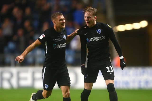 Ronan Curtis, right, celebrates his opener with Lee Brown Picture: Phil Oldham