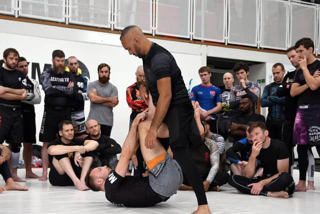 Craig Jones imparts his Brazilian jiu-jitsu wisdom at Gym 01. Picture: Neil Marshall