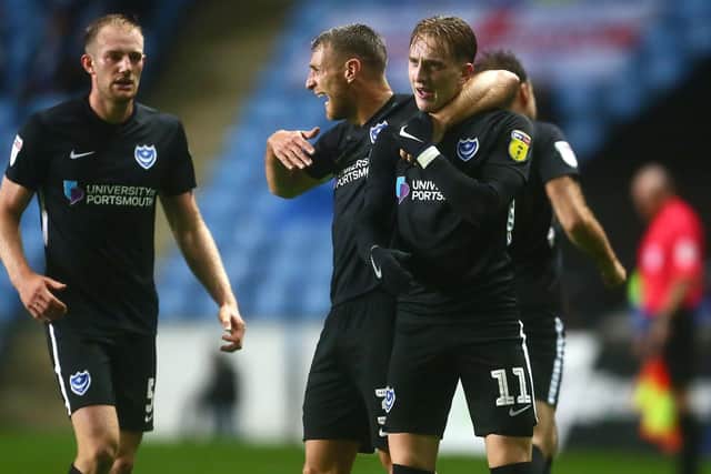 Pompey's players celebrate Ronan Curtis' decisive strike at Coventry. Picture: Philip Oldham