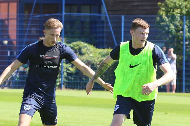 Dion Donohue, right, and Adam May during Pompey training