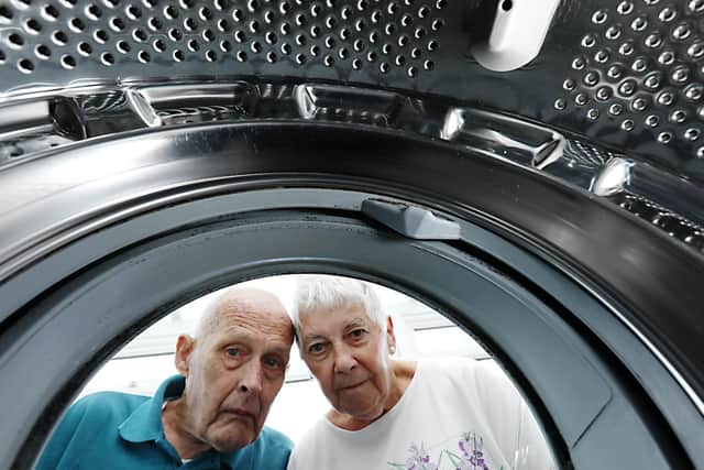 Bob and Myra Rayner with the washing machine at their home in Horndean      Picture: Chris Moorhouse