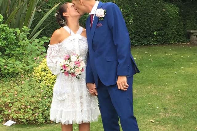 Sara and Paul on their wedding day last August