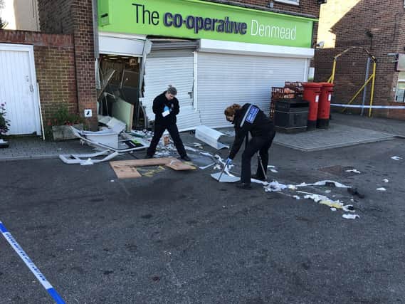 Forensics officers at Co-op in Hambledon Road in Denmead on October 3 2018 after a cash machine was ripped from the building. Picture: Tamara Siddiqui