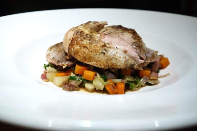 Roast partridge with cabbage, bacon and chestnuts