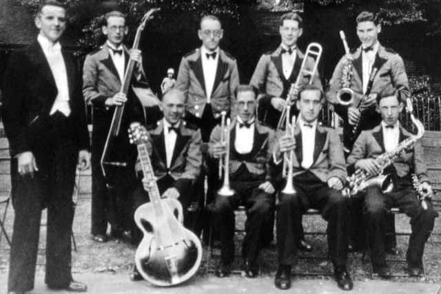 Sent from Australia by John Rich, his fathe, also John, is the trumpet player second from the left in the front row.