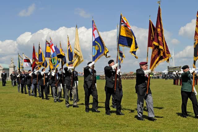 Standard bearers march at  Southsea Common for the The D-Day 70 Drumhead Service with The Princess Royal - Princess Anne, in June 2014. Picture: Malcolm Wells