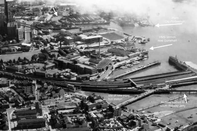 A view over Portsmouth Harbour station towards HMS Vernon and the power station, 1952.