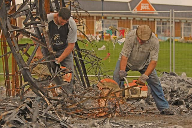 The remainders of the dinosaur on Southsea Common being removed. Picture: Sarah Standing