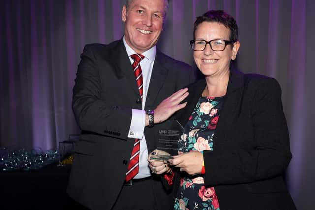 David Jeapes presents the Creativity and Innovation award to the performance and design team at Admiral Lord Nelson School