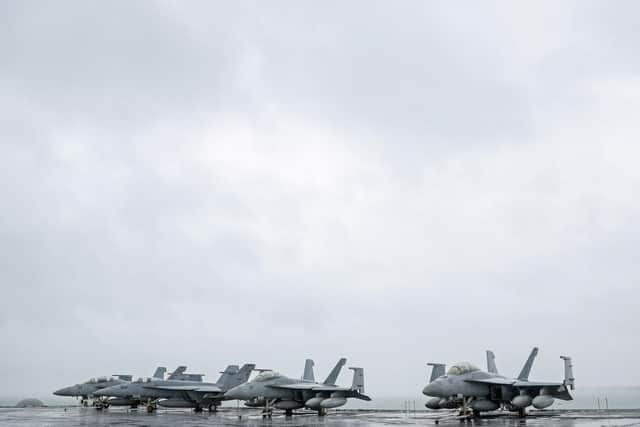 F-18 jets on board USS Harry S Truman. Photo: Andrew Matthews/PA Wire
