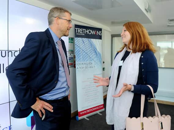 Mark Waldron, editor of The News, Portsmouth, talks to Becky Taylor, community investment associate at BAE Systems at the The News' Business Excellence Awards breakfast launch