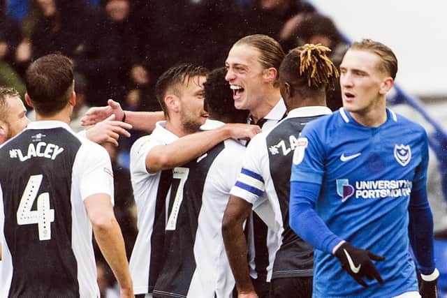 Tom Eaves celebrates his outstanding striker. Picture: Barry Zee