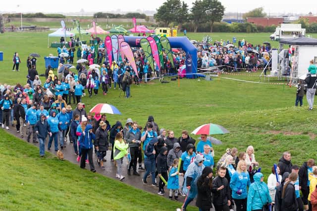 Walkers stride out to raise money for the Alzheimer's Society at Castle Field, Southsea
