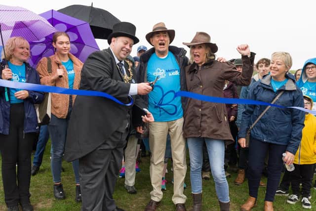 Cutting the ribbon to start the walk (centre, from left) The Lord Mayor of Portsmouth,  Cllr Lee Mason, Andrew McCall and Caroline Dinenage MP Minister of State for Care.