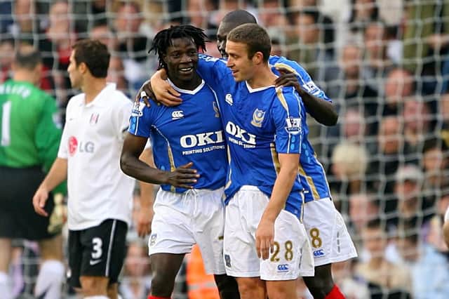 Benjani, left, celebrates scoring against Fulham at Craven Cottage with Papa Bouba Diop and Sean Davies