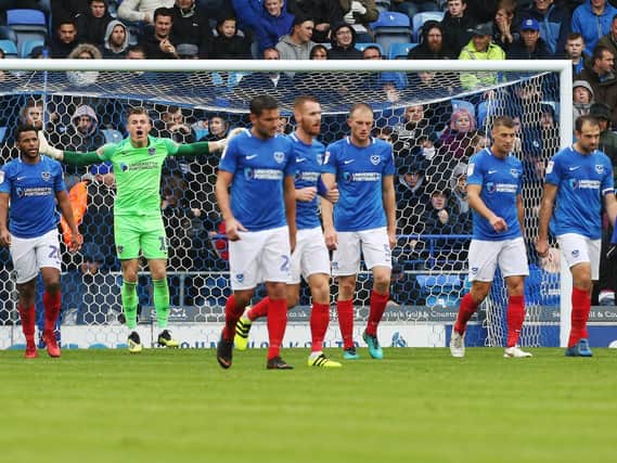 Pompey fell to their first league defeat of the season against Gillingham. Picture: Joe Pepler