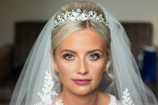 The beautiful bride, Helen Clark, on her big day in August
