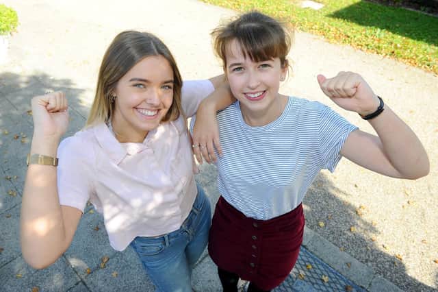 Jessica Knight, 16, left,  who obtained two 9s, seven 8s, one 7 and 3As and Holly Plater, 16, who obtained 9 across the board in her GCSEs 
Picture: Sarah Standing (180760-5857)