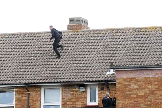 Rooftop standoff in Murefield Road, near Asda, Fratton, Portsmouth. Picture: Habibur Rahman