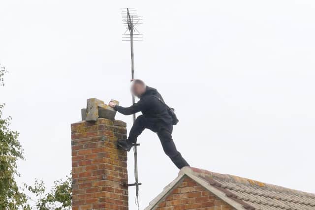 Rooftop standoff near Asda, Fratton, Portsmouth. Picture: Habibur Rahman