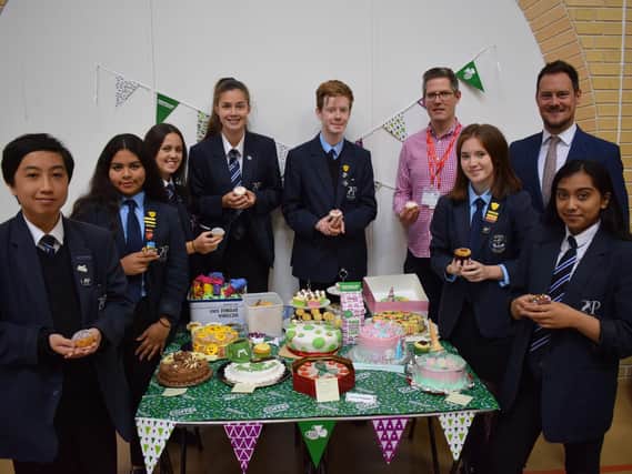 Priory School students with their cakes and Portsmouth South MP Stephen Morgan. Picture: Supplied