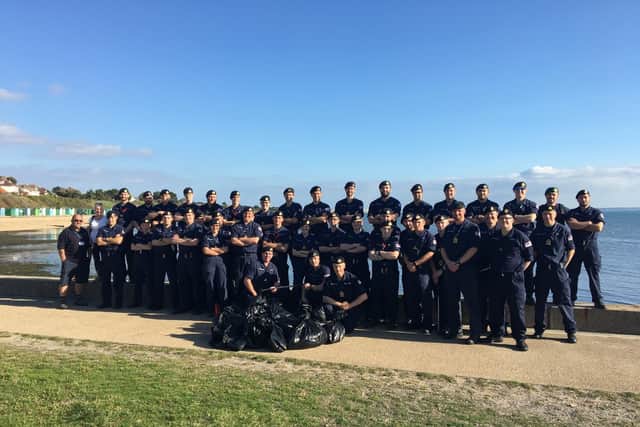 The crew from HMS Collingwood down at the beach. Picture: Lt Cdr Leonard