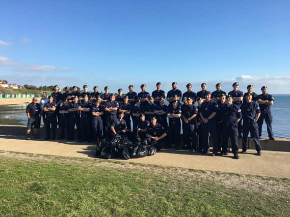 The crew from HMS Collingwood down at the beach. Picture: Lt Cdr Leonard