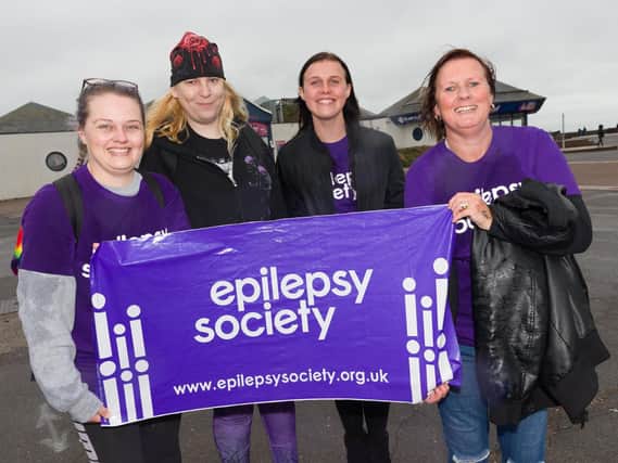 Family and friends of Leigh Worboys, who died from epilepsy in April, took part in a charity walk in Southsea. Picture: Duncan Shepherd