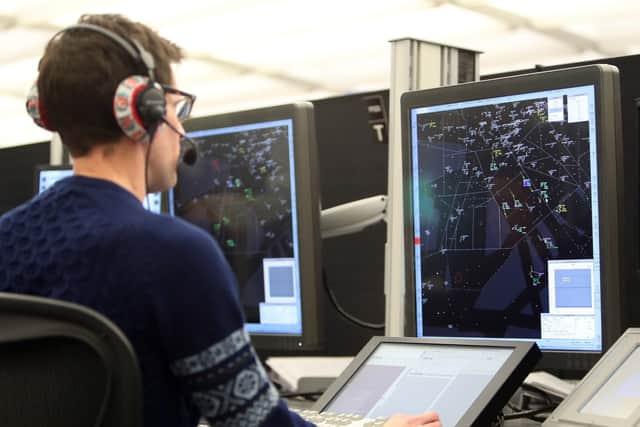 Air traffic controller in action
Photo: Steve Parsons/PA