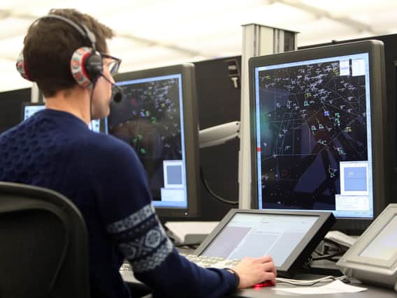 Air traffic controller in action
Photo: Steve Parsons/PA