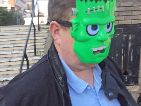 Aaron Jones wore a Frankenstein mask outside court. Picture: PA