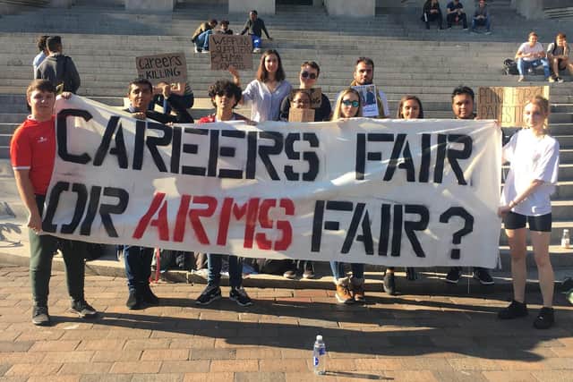 Students from the University of Portsmouth protesting in Guildhall Square over defence firms being allowed to attend a graduate recruitment fair in Guildhall.