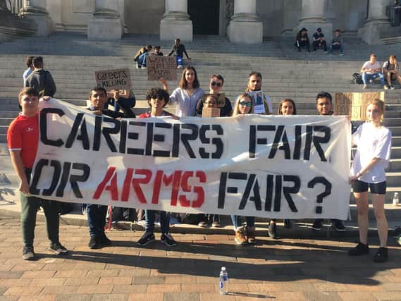 Students from the University of Portsmouth protesting in Guildhall Square over defence firms being allowed to attend a graduate recruitment fair in Guildhall.