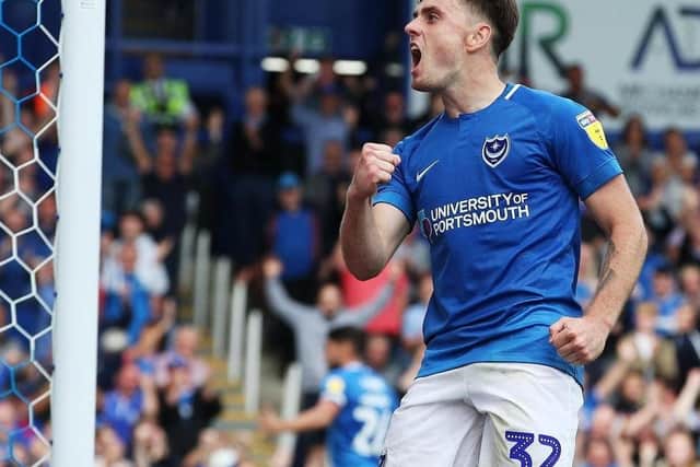 Ben Thompson celebrates a Fratton afternoon to savour against Oxford. Picture: Joe Pepler