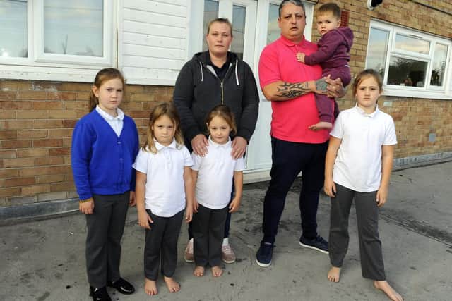 Aaron Baker and his family live in a council-owned maisonette above Select and Save in Park House Farm Way, Leigh Park, Havant
The Baker family, from left, Milly, seven, Lola Baker, five, Patricia, 29, Lottie, five, Aaron, 32, with Freddie, two, and Macey, nine
Picture: Malcolm Wells (181003-4102)