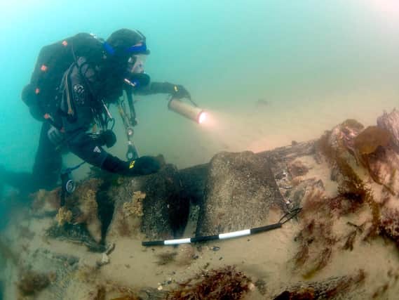 Divers uncovering the mysteries of HMS Invincible. Picture: Michael Pitts/Pascoe Archaeology Services