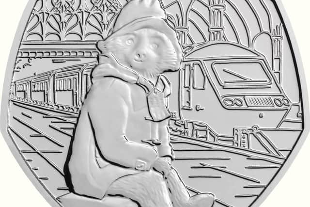 One of the coins will feature the Peruvian bear sat at Paddington station. Picture: The Royal Mint/PA Wire