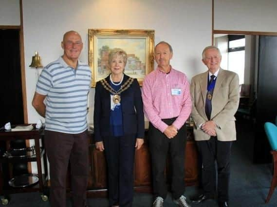 Mike and Pete in the Mayors Parlour presenting a cheque for 1,420 to the Mayor