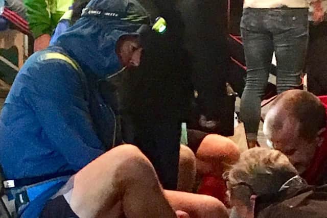 Russell tending to his feet