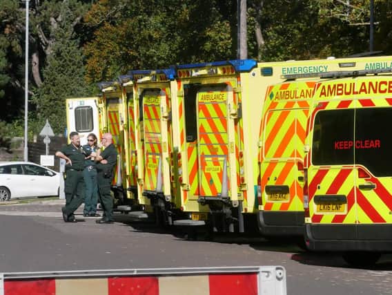 Over a dozen ambulance vehicles parked at A&E entrance at QA hospital