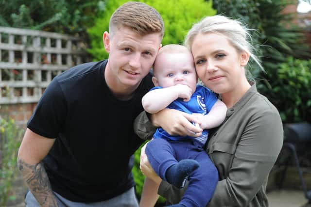 Dion Donohue with Nadine and their son, Mason at home in Portsmouth Picture: Habibur Rahman